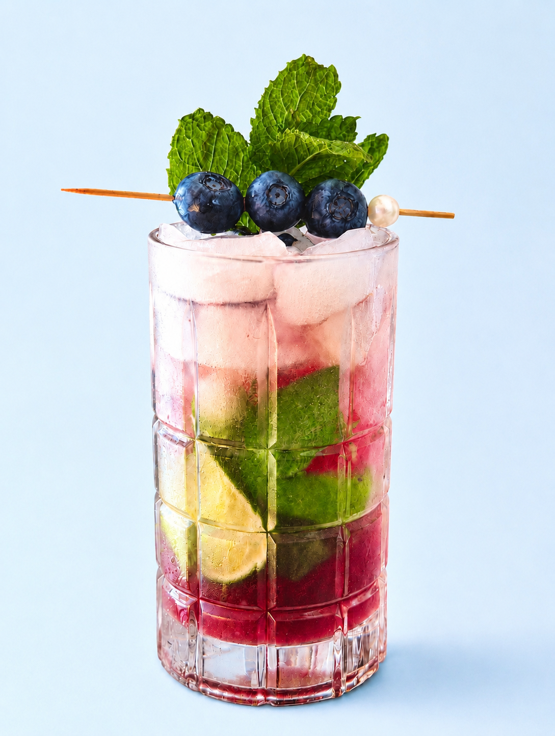 The Something Blueberry Mojito with blueberries, lime and mint