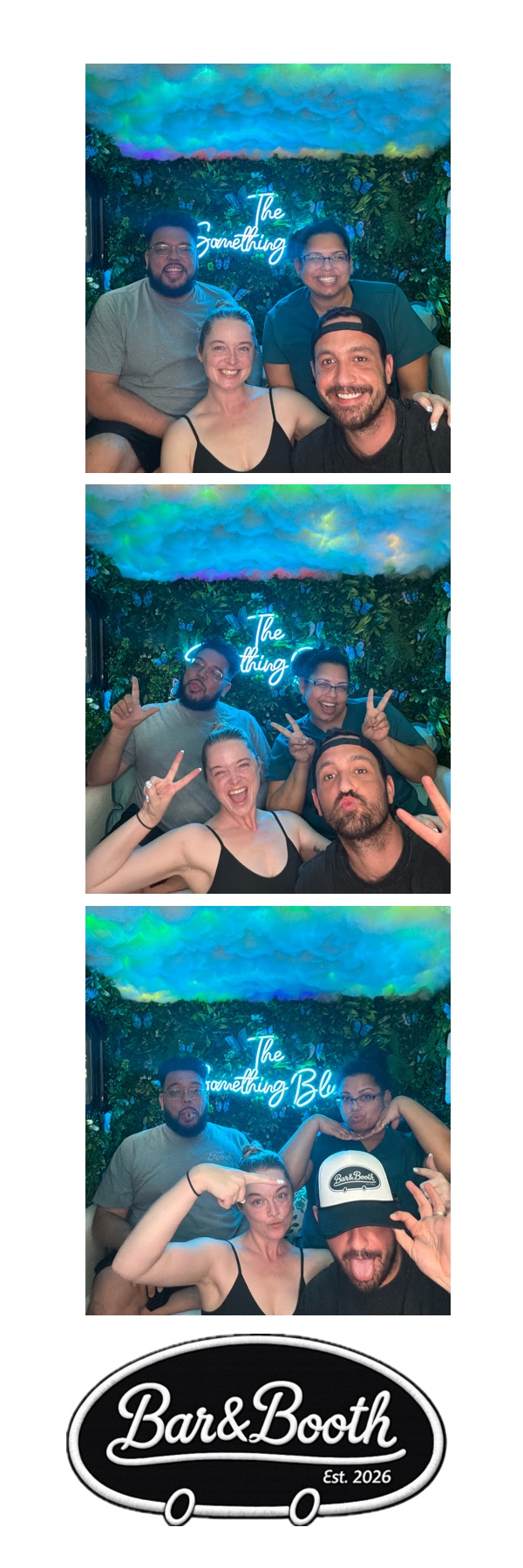 Guests in the Bar&Booth photo booth with props